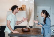 Couple in a heated discussion before apologizing after a hurtful argument