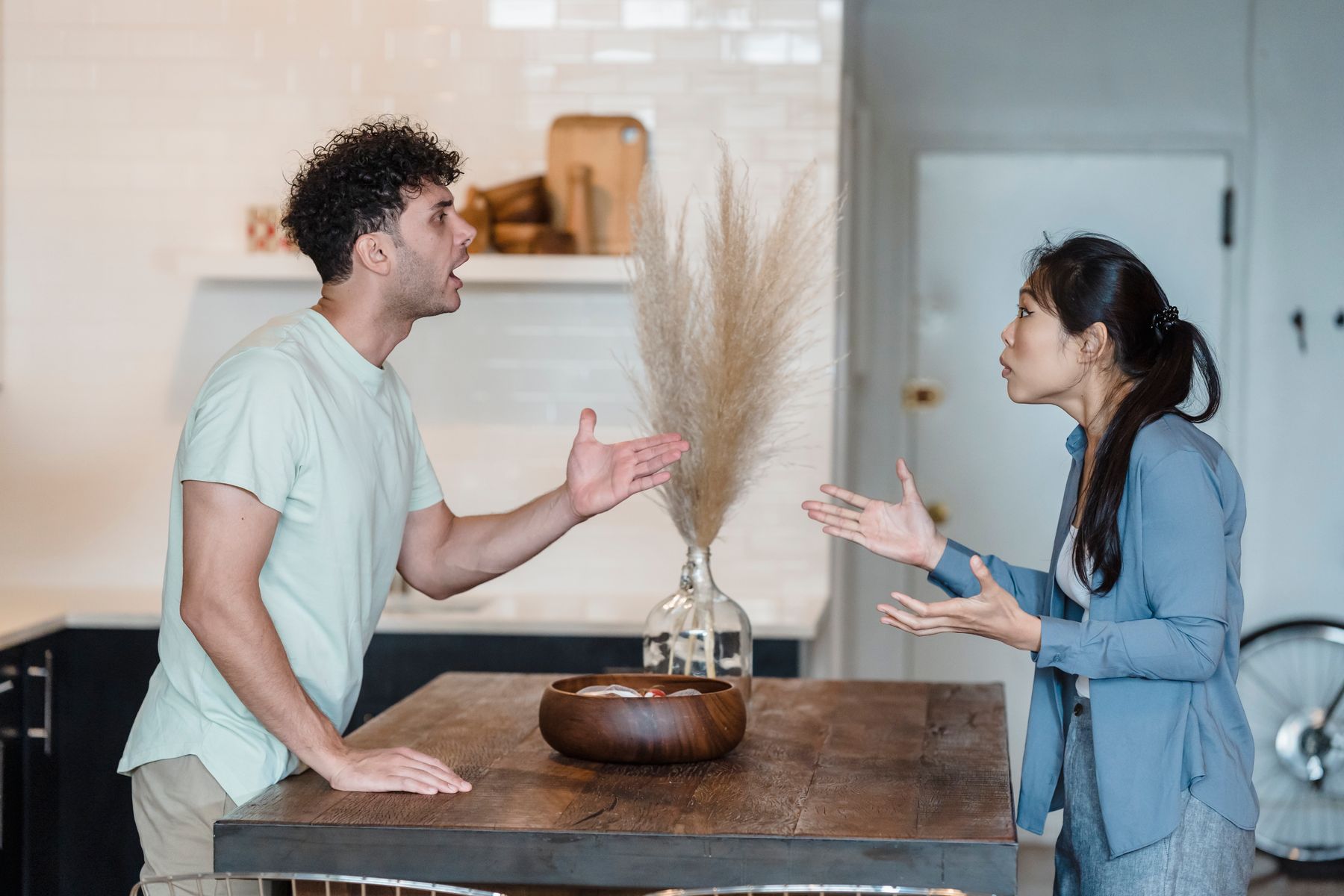 Couple in a heated discussion before apologizing after a hurtful argument