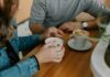 How to Approach Someone You Don’t Know Without Making Them Uncomfortable Two coffee mugs representing a low-pressure first conversation