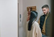 Married couple discussing boundaries with in-laws at home