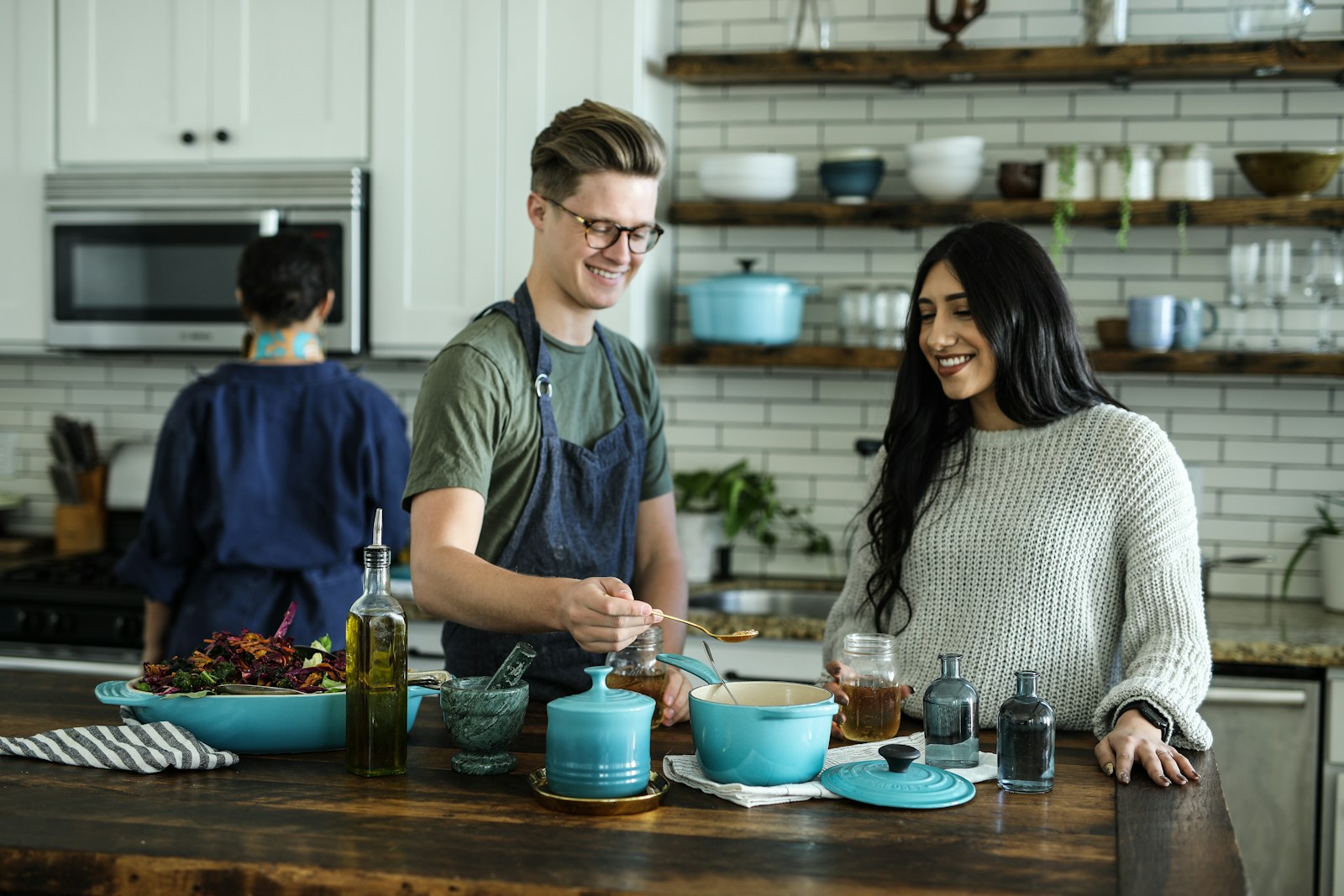 Couple cooking together as they rebuild everyday connection in marriage