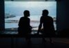 Couple sitting in silence while experiencing emotional distance