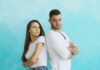 Couple standing back to back after a tense disagreement about fairness in the relationship