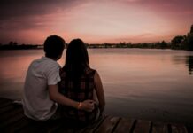 Couple sitting together while facing a difficult relationship choice