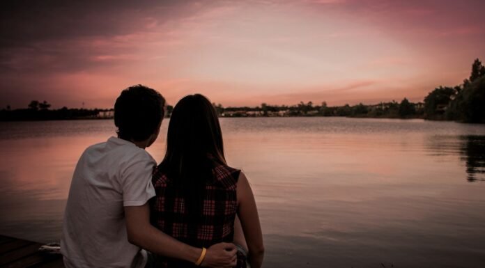 Couple sitting together while facing a difficult relationship choice