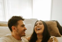 Married couple sharing a relaxed conversation while reconnecting at home