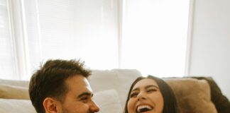 Married couple sharing a relaxed conversation while reconnecting at home