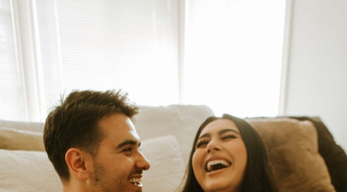 Married couple sharing a relaxed conversation while reconnecting at home