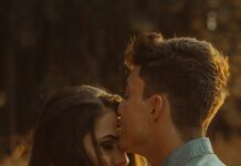When Your Partner Doesn’t Say I Love You: What It May Mean Partner showing quiet affection through a kiss on the forehead