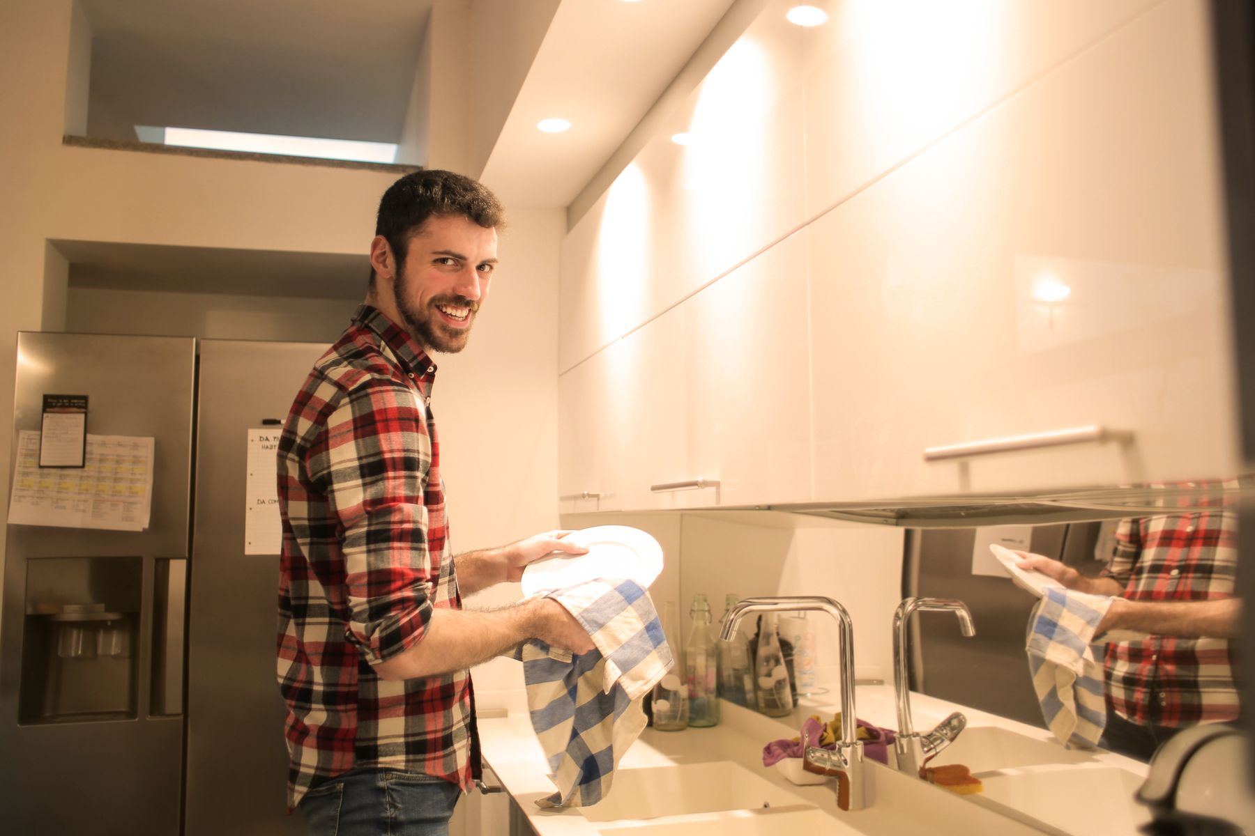 Partner cleaning dishes as part of an agreed household task