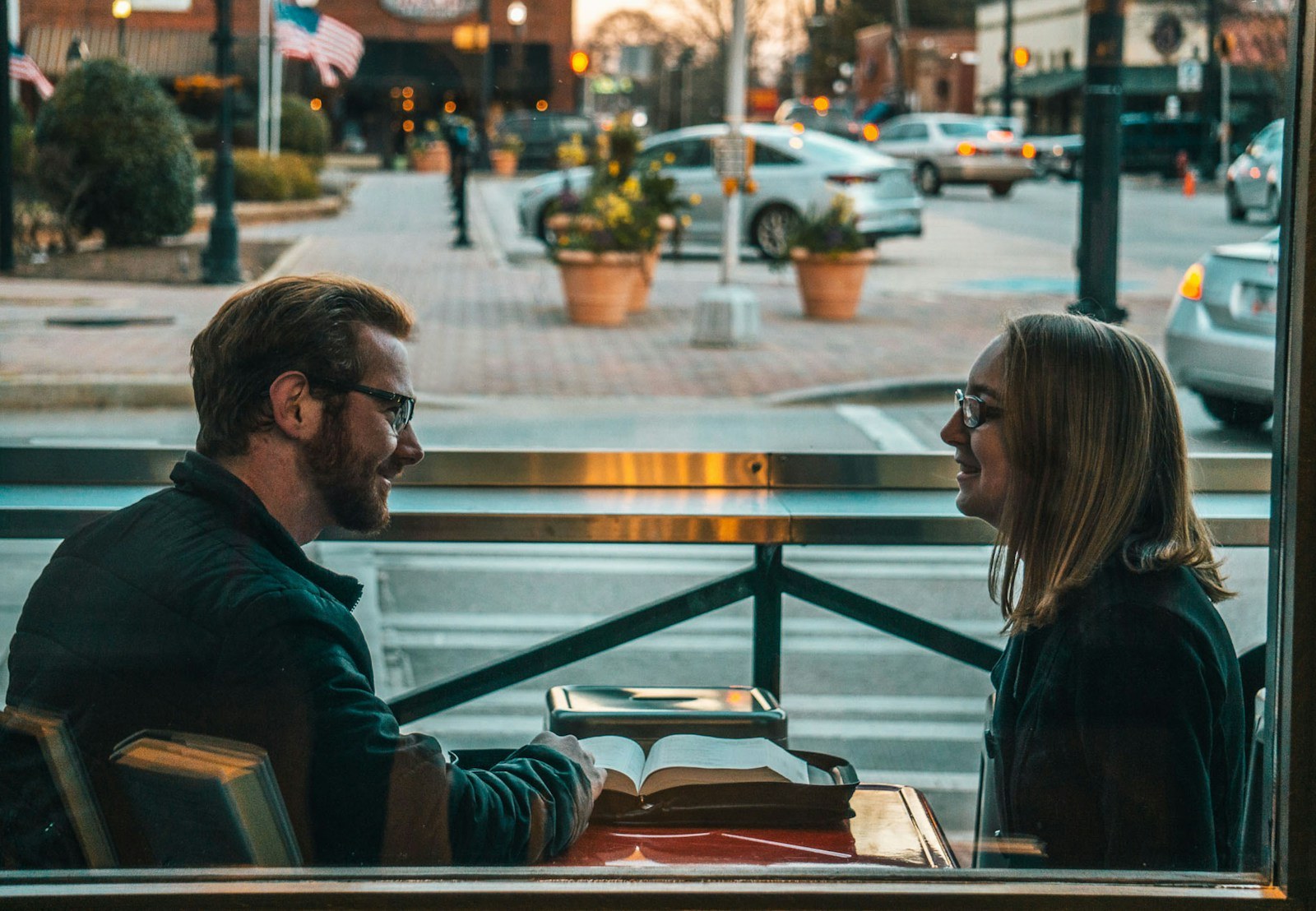 Two people having a respectful conversation in a public place