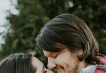Couple laughing together during a personal Valentine's Day date