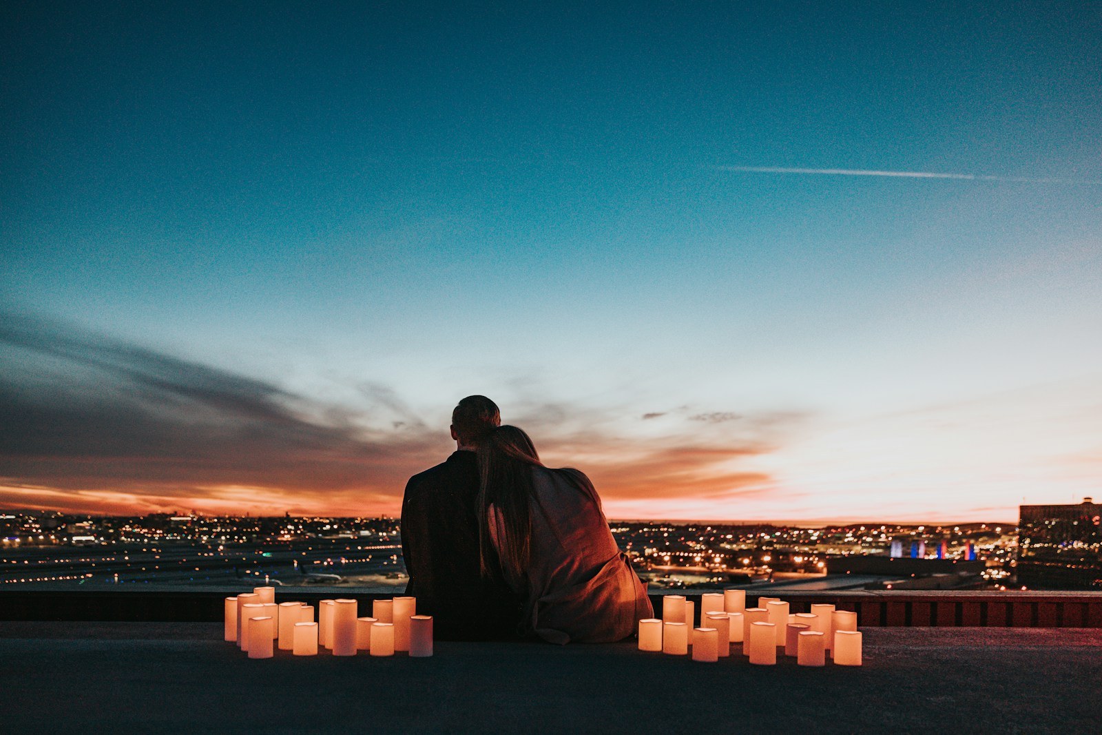 Couple spending quiet quality time together overlooking the city
