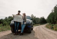 Couple navigating together during a road trip