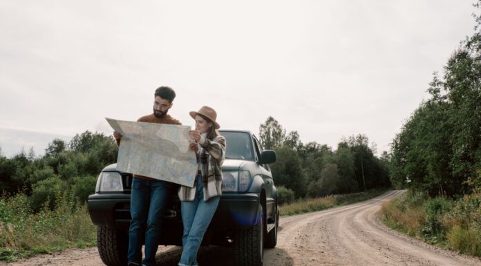 When Your Partner Is a Backseat Driver: How to Make Car Trips Less Tense Couple navigating together during a road trip