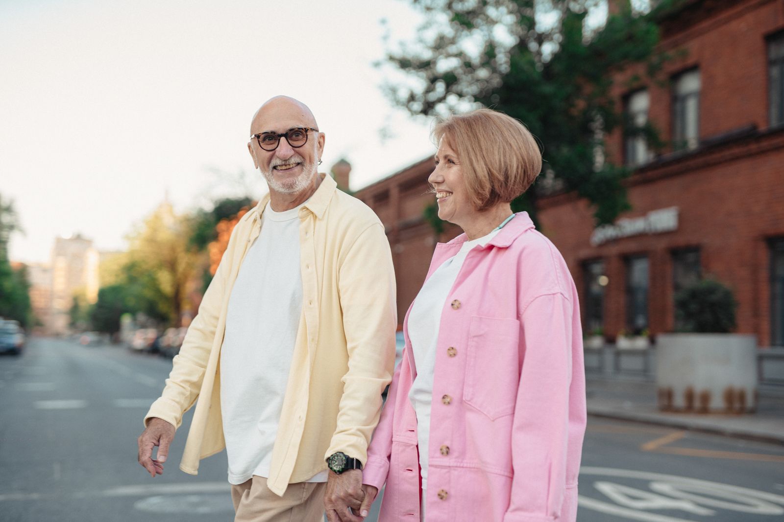 Older couple walking together while keeping room for individual retirement plans