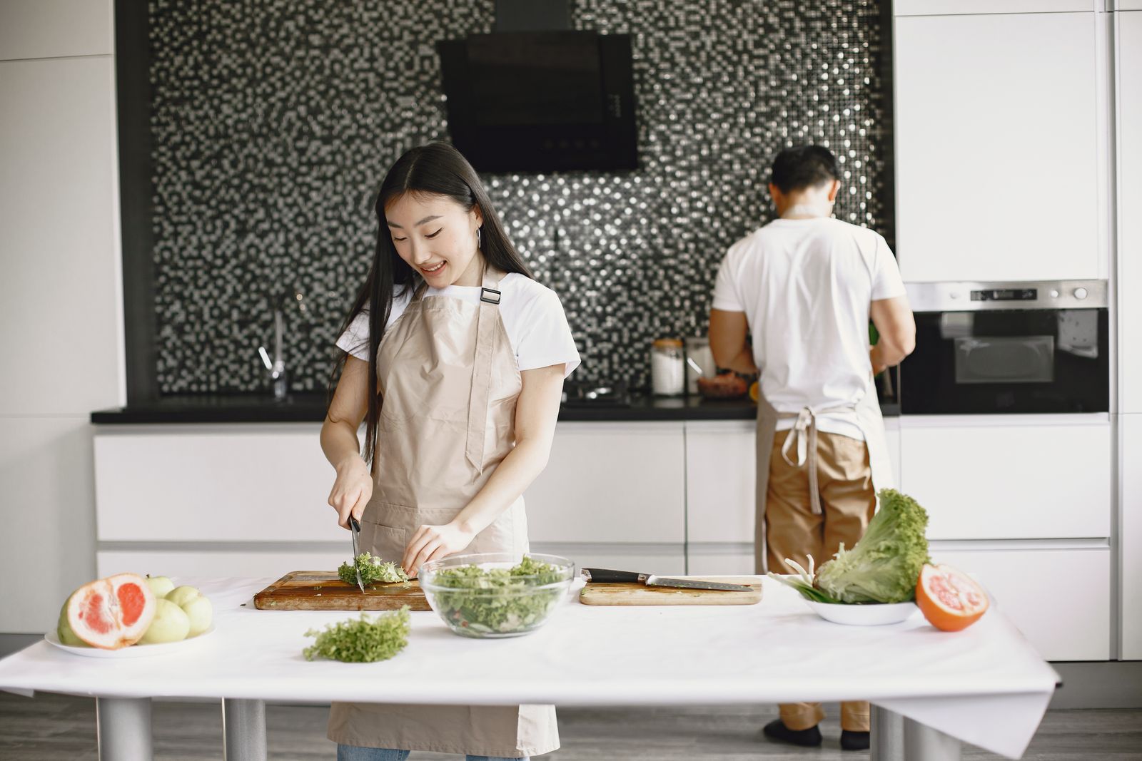 Couple cooking together while respecting different food preferences