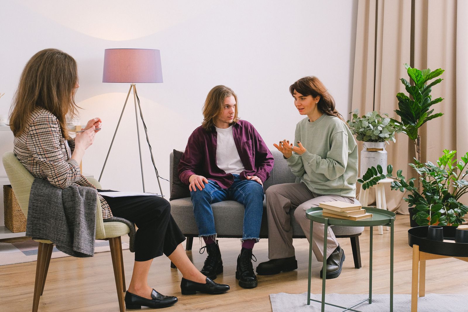 Couple discussing a major life decision with a counselor