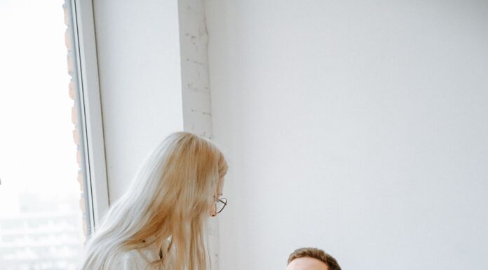 Couple discussing houseguest boundaries together at home