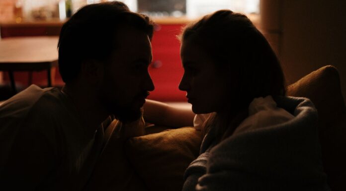 When Your Partner Leaves the Lights On: How to Stop the Same Argument Couple discussing household lighting habits at home