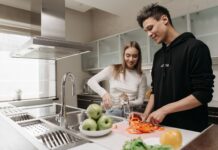 When Your Partner Eats the Food You Were Saving: How to Set Kitchen Boundaries Couple discussing boundaries around saved food in their kitchen