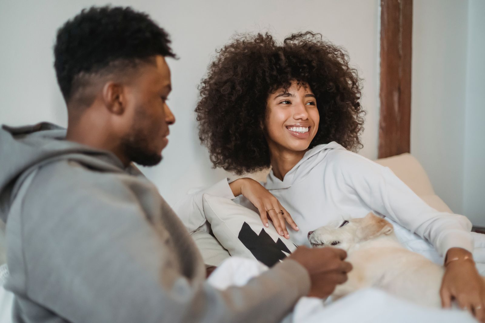 Couple discussing whether to bring a dog into their shared home