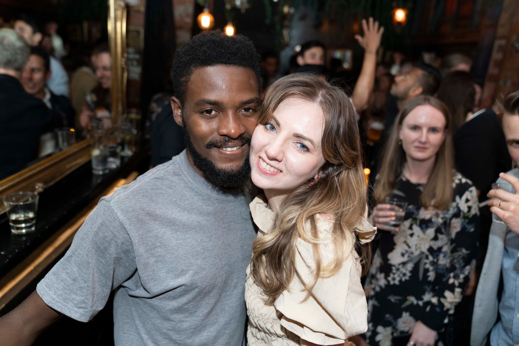 Couple enjoying a social gathering together