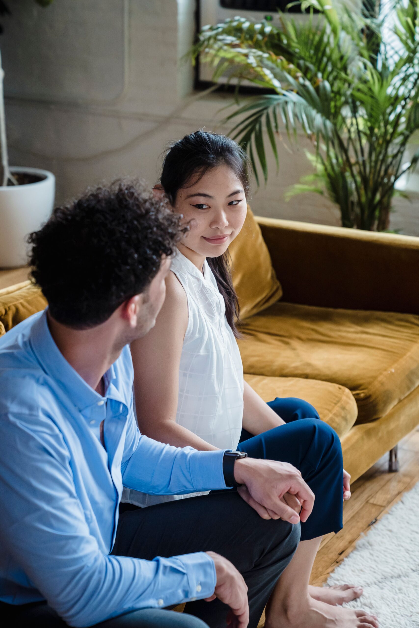 Couple holding hands during a calm conversation about intimacy