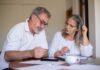 Older couple reviewing plans for their different retirement goals