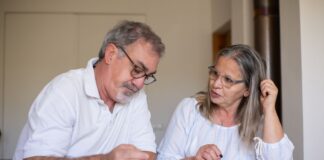 Older couple reviewing plans for their different retirement goals