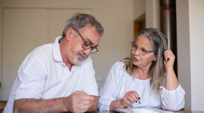 Older couple reviewing plans for their different retirement goals