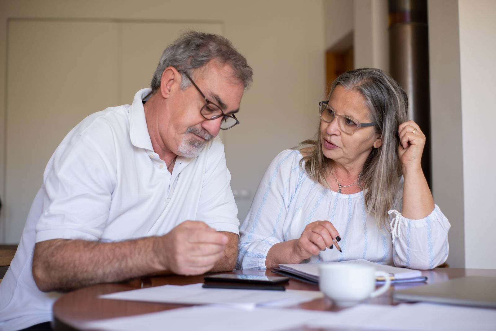 Older couple reviewing plans for their different retirement goals