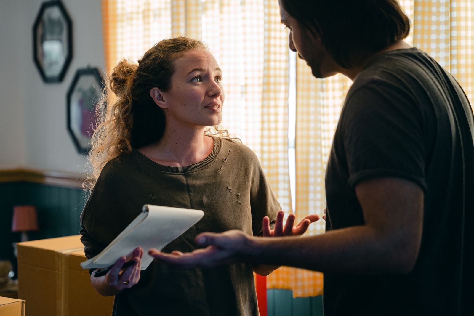 Couple using a notebook to plan a major decision together