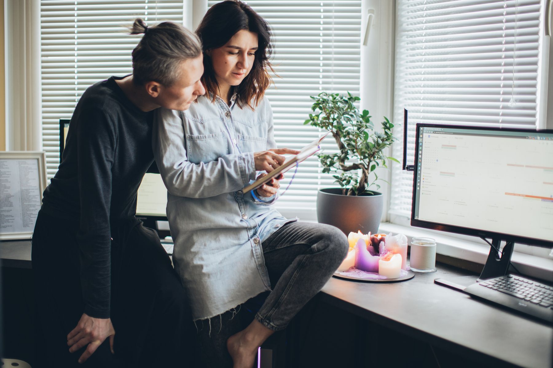 Couple planning social activities and quiet time at home