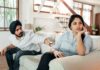 Couple talking about repeated canceled plans at home
