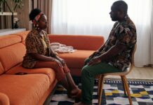 Couple talking about meeting friends and family