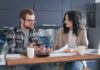When Your Partner Compares You to Their Ex: How to Respond Without Competing Couple talking calmly after a comparison to an ex