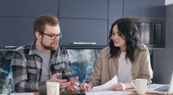 Couple talking calmly after a comparison to an ex