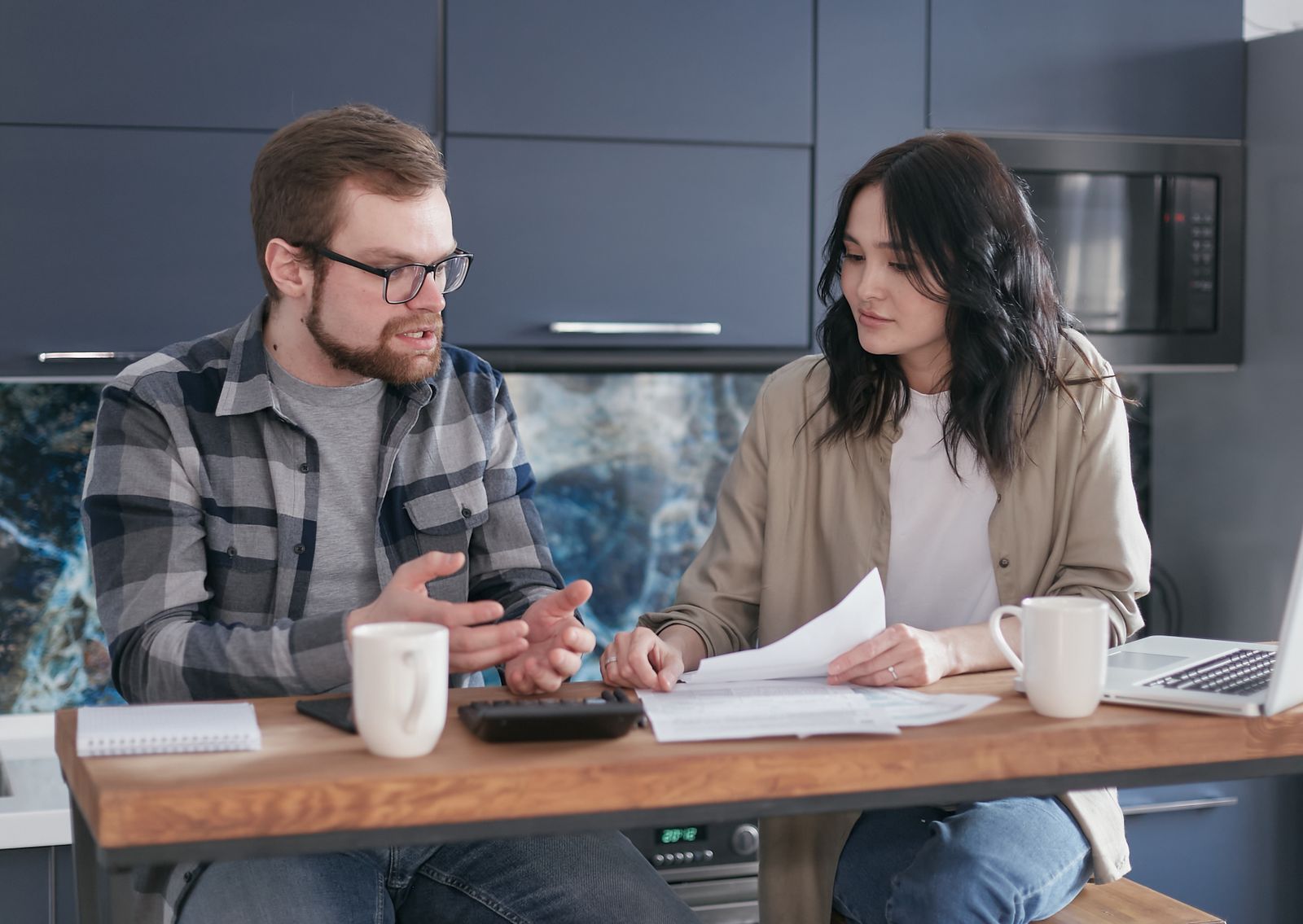 Couple talking calmly after a comparison to an ex
