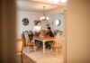Couple talking together at the dining table after a workday
