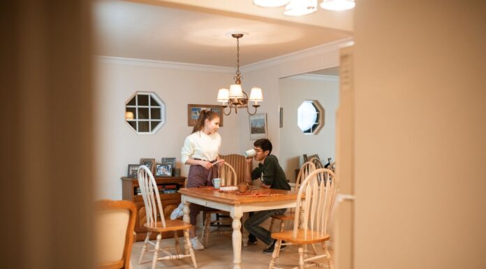 Couple talking together at the dining table after a workday