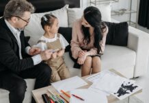 Parents talking with their child during a calm family conversation