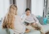 How Introvert-Extrovert Couples Can Balance Social and Alone Time Couple enjoying quiet reading time together at home