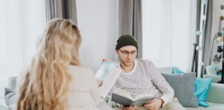 Couple enjoying quiet reading time together at home