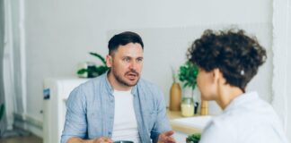 Couple having a serious conversation about repeated lateness