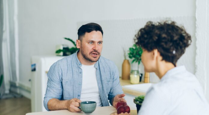 Couple having a serious conversation about repeated lateness