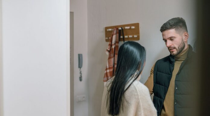 Couple discussing a pattern of constant corrections at home