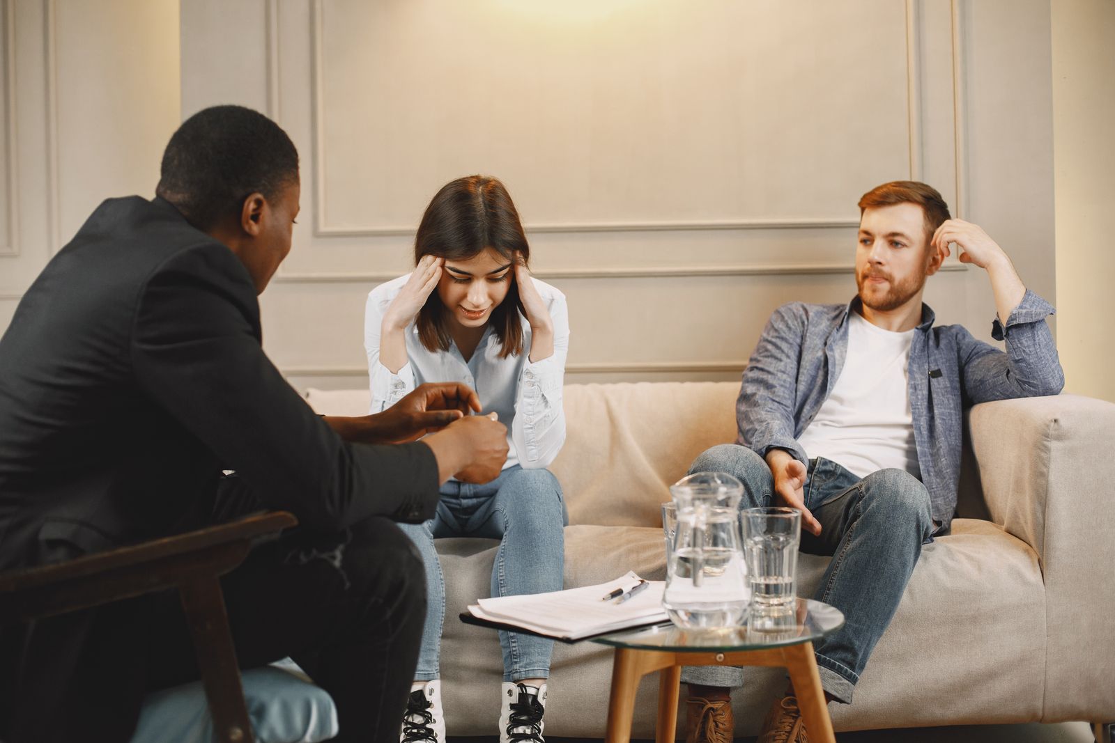 Couple discussing relationship concerns during a counseling session