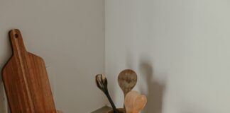 Clean kitchen counter with utensils after a household reset