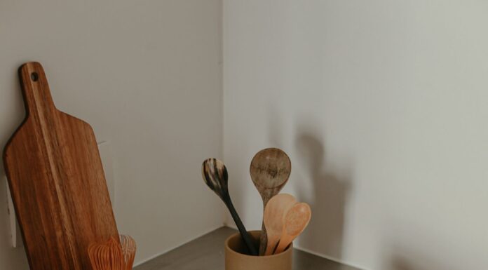 When Your Partner Leaves Crumbs on the Counter: How to Fix the Cleanup Habit Without Nagging Clean kitchen counter with utensils after a household reset